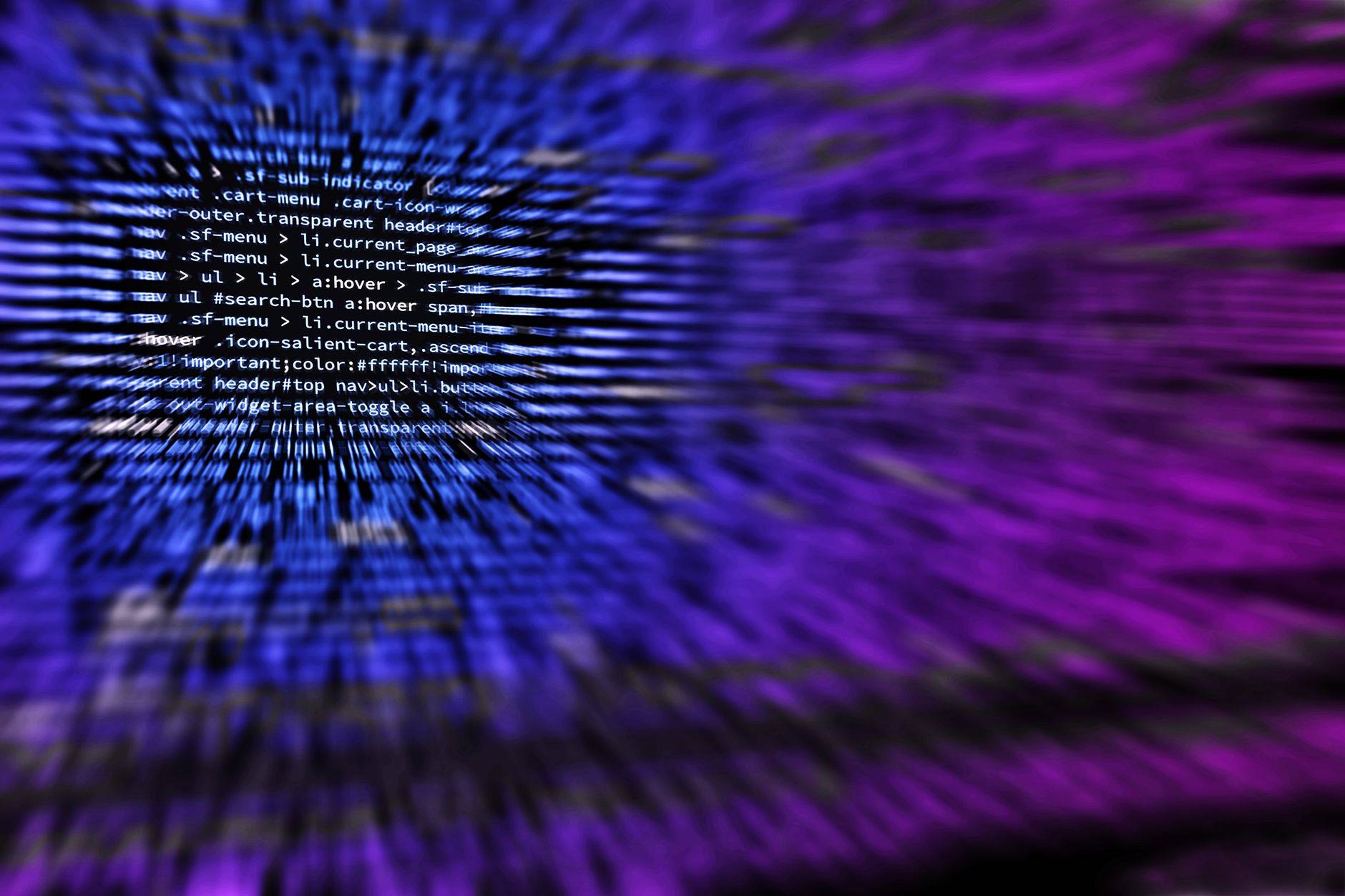 Rozmyty kod komputerowy na abstrakcyjnym tle cyberbezpieczeństwa